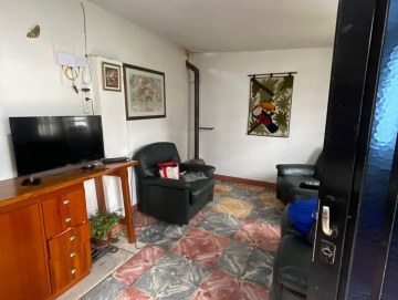 Casa con piscina sobre lote de 1.750 m² y segunda vivienda a restaurar