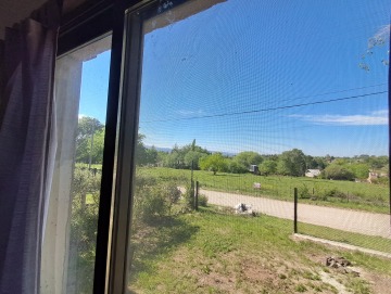 Alquiler permanente. Casa de dos dormitorios a 1 cuadra de la ruta s-271. Los Reartes.