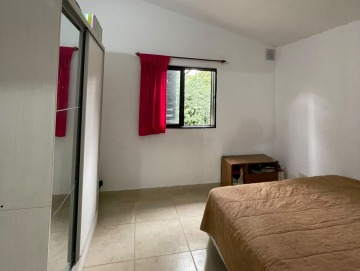 Casa con piscina sobre lote de 1.750 m² y segunda vivienda a restaurar